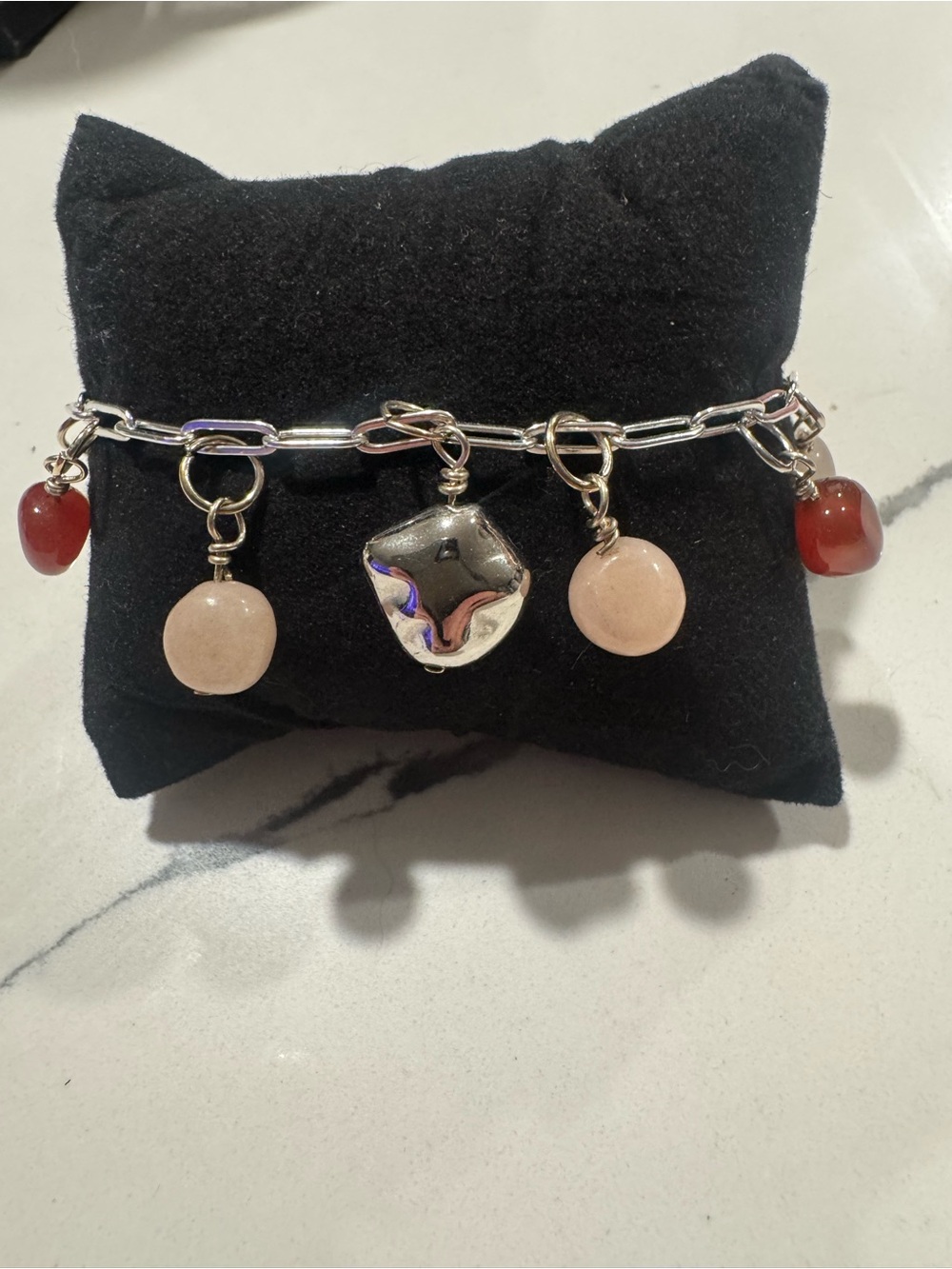 Handcrafted Silver Charm Bracelet with moonstone and carnelian stone accents